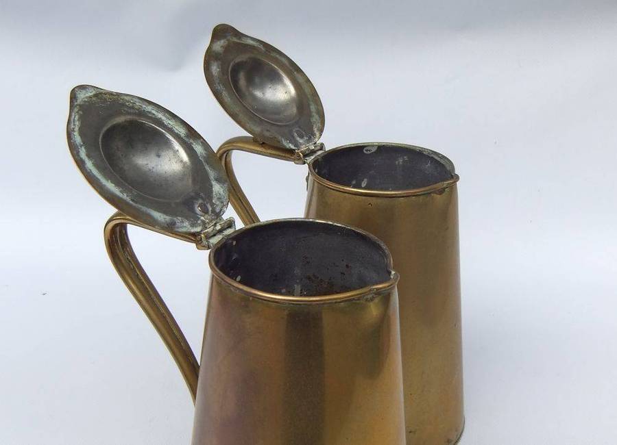 A rare pair of Art Nouveau era brass water jugs by Joseph Sankey & Sons with hinged lids
