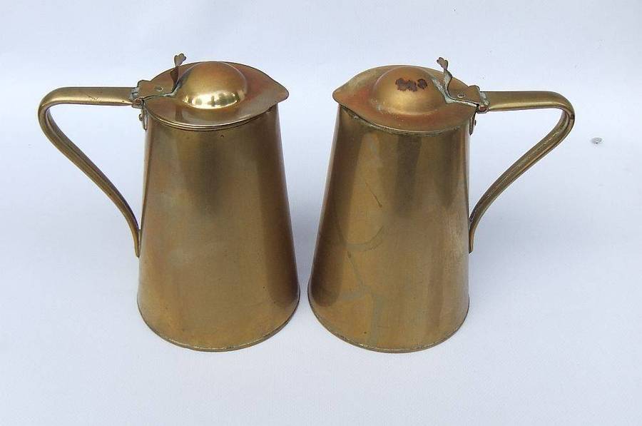 A rare pair of Art Nouveau era brass water jugs by Joseph Sankey & Sons with hinged lids