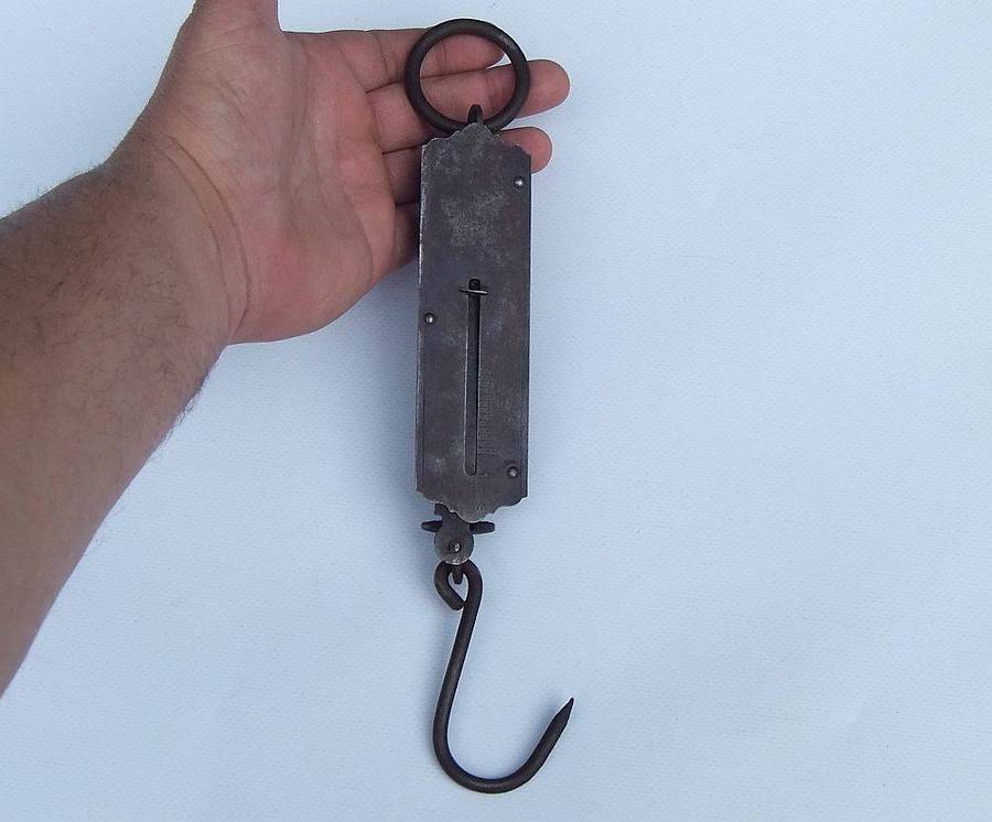 An old pocket balance scale made in Germany
