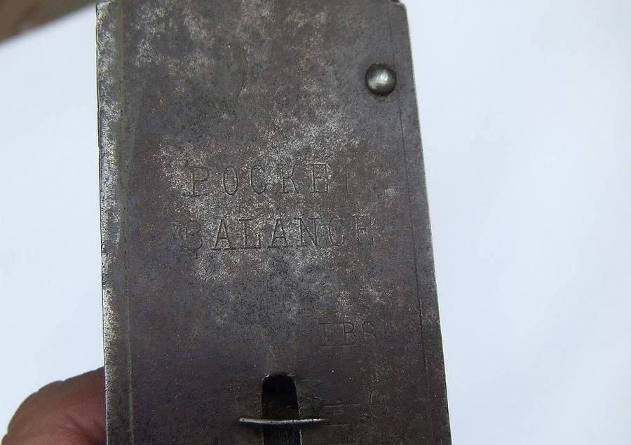An old pocket balance scale made in Germany