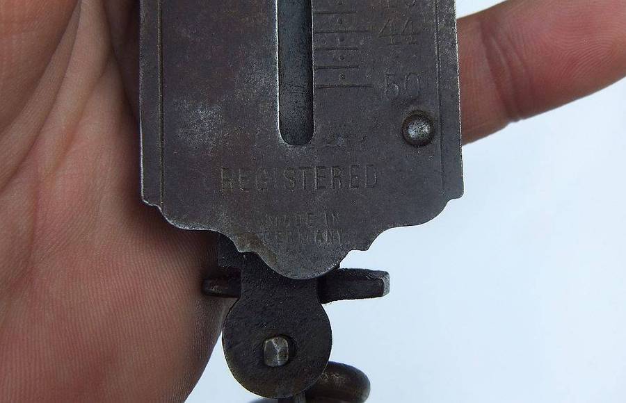 An old pocket balance scale made in Germany