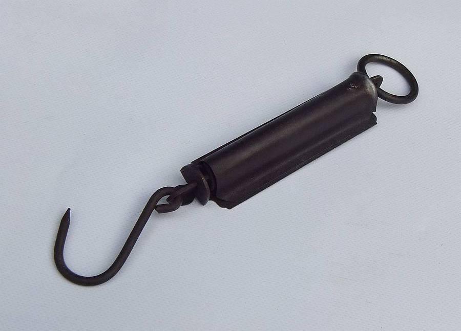 An old pocket balance scale made in Germany