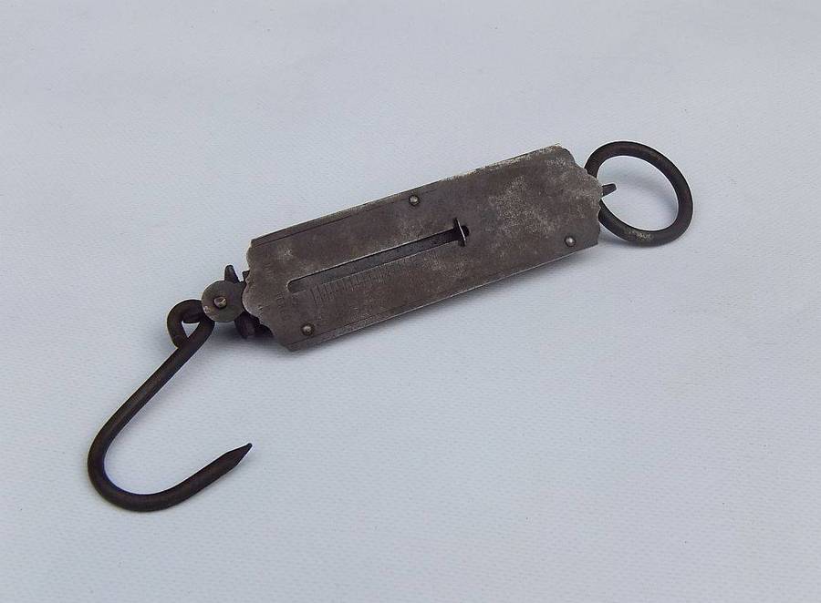 An old pocket balance scale made in Germany