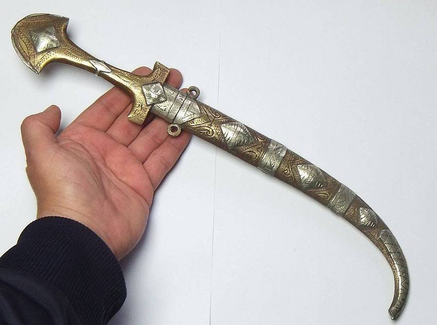 A large vintage Turkish dagger with detailed sheath in display condition