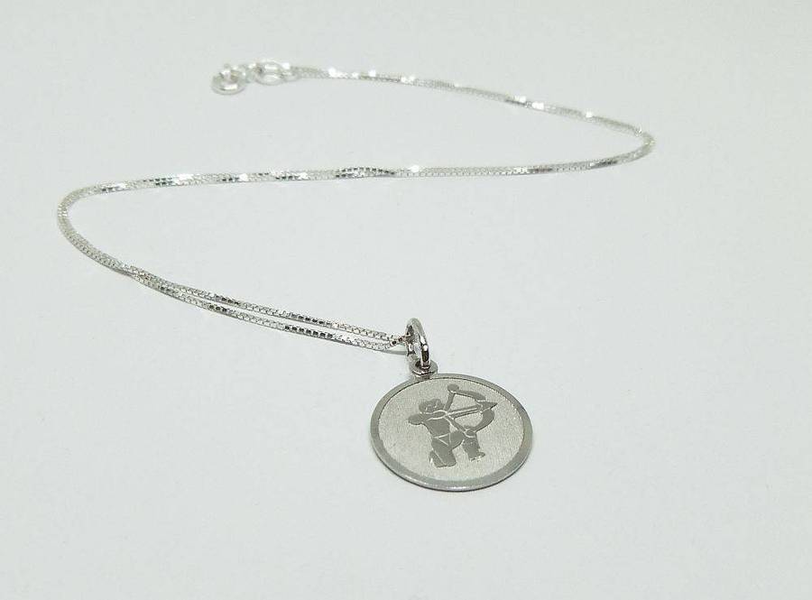 A vintage sterling silver Sagittarius Zodiac sign pendant with a sterling silver necklace