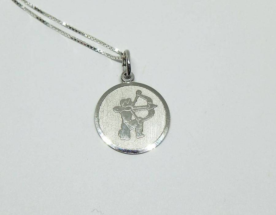 A vintage sterling silver Sagittarius Zodiac sign pendant with a sterling silver necklace