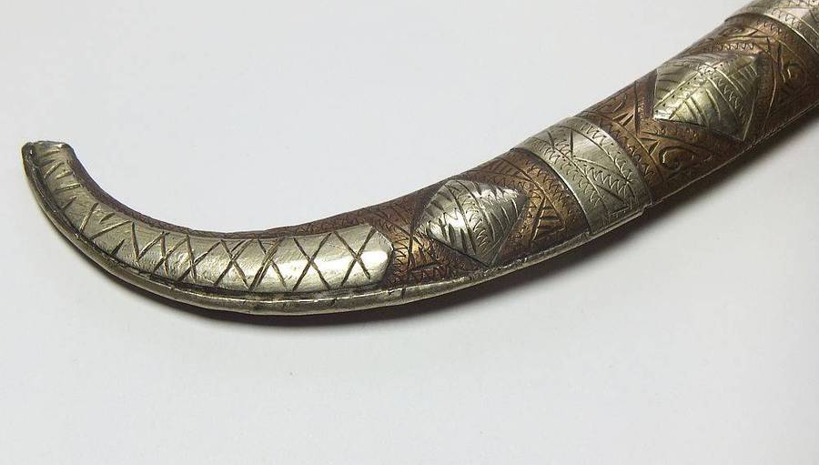 A large vintage Turkish dagger with detailed sheath in display condition