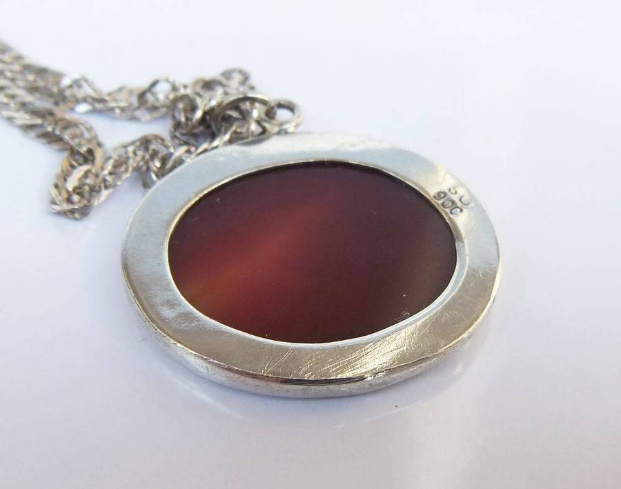 A stunning twist design sterling silver necklace with engraved Carnelian stone 90% silver pendant