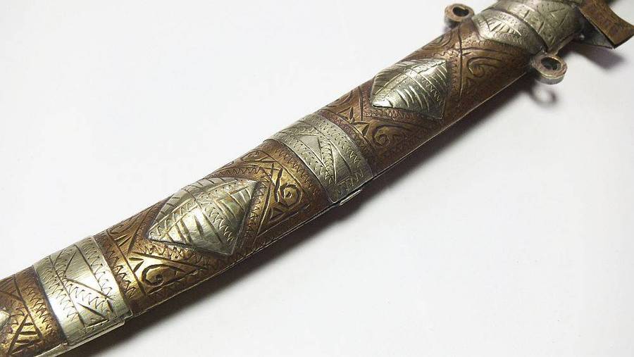 A large vintage Turkish dagger with detailed sheath in display condition