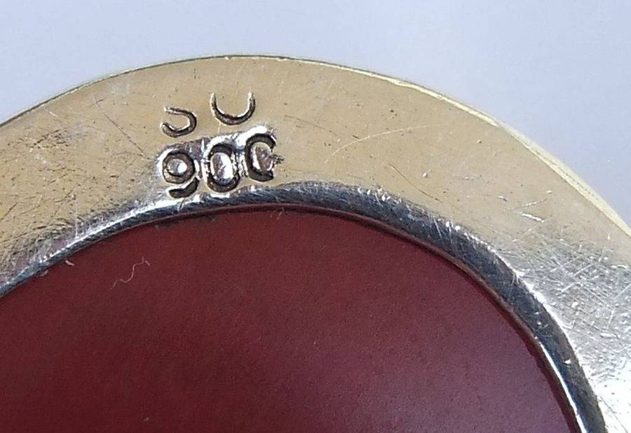 A stunning twist design sterling silver necklace with engraved Carnelian stone 90% silver pendant