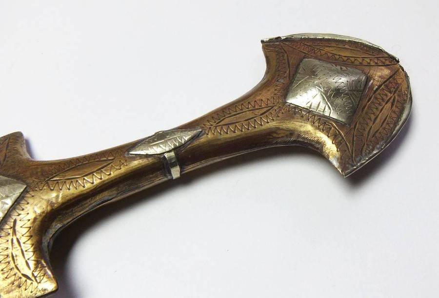 A large vintage Turkish dagger with detailed sheath in display condition