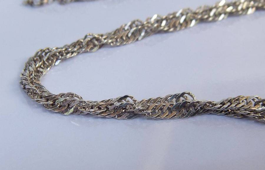 A stunning twist design sterling silver necklace with engraved Carnelian stone 90% silver pendant