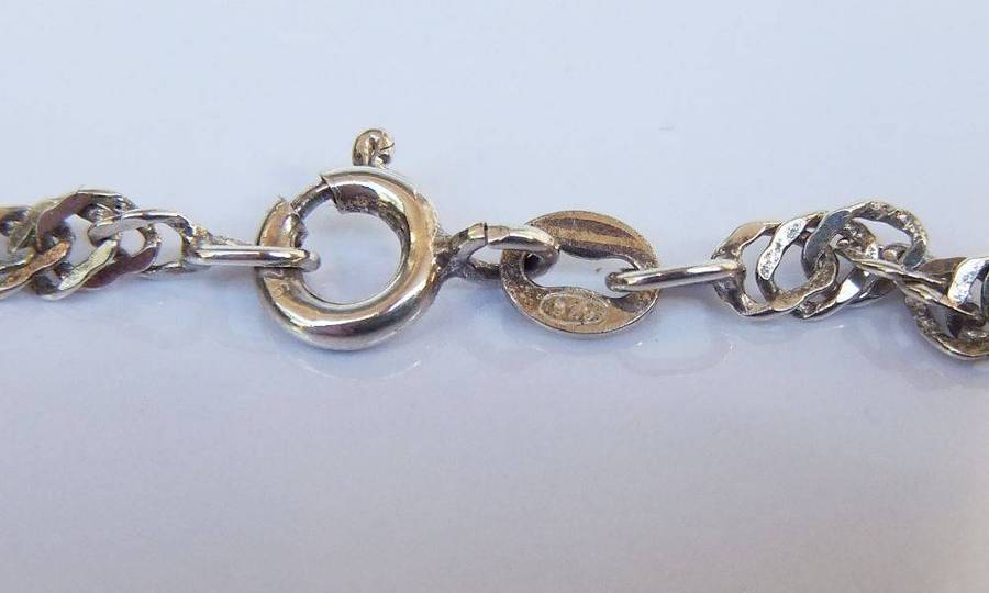 A stunning twist design sterling silver necklace with engraved Carnelian stone 90% silver pendant