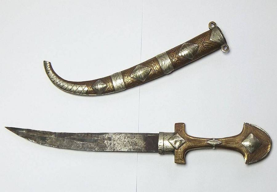 A large vintage Turkish dagger with detailed sheath in display condition