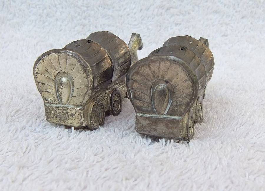 TOO CUTE !! A RARE PAIR OF VINTAGE METAL COWBOY WAGON SALT & PEPPER SHAKERS !! GREAT DETAIL !!