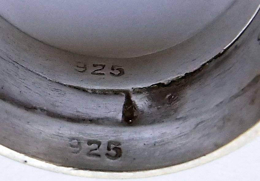 A BEAUTIFUL STERLING SILVER RING WITH FACETED BLUE CZ AND CLEAR CZ STONES - 3 MADE INTO ONE