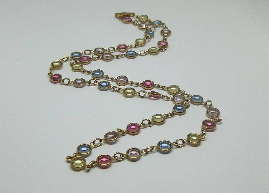 A stunning vintage gold plated necklace with faceted coloured glass insets