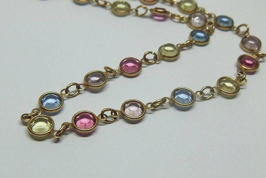 A stunning vintage gold plated necklace with faceted coloured glass insets