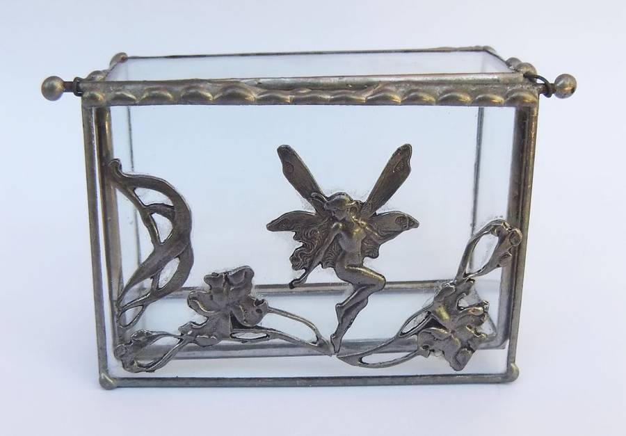 A VINTAGE LEAD AND GLASS TRINKET BOX WITH FAIRY MOTIF AND ART NOUVEAU PATTERN