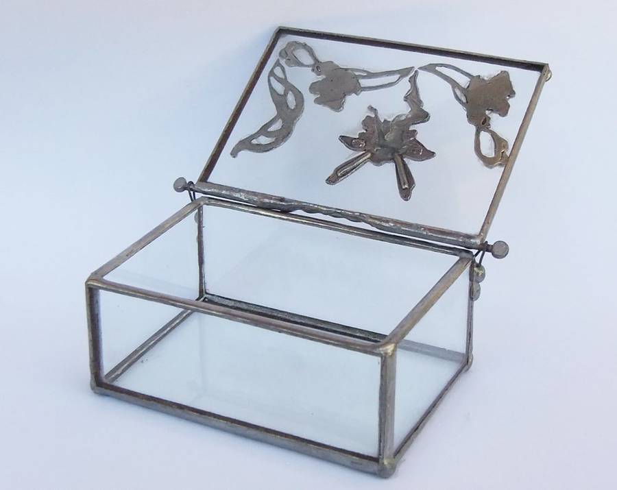 A VINTAGE LEAD AND GLASS TRINKET BOX WITH FAIRY MOTIF AND ART NOUVEAU PATTERN