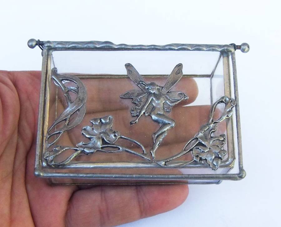 A VINTAGE LEAD AND GLASS TRINKET BOX WITH FAIRY MOTIF AND ART NOUVEAU PATTERN