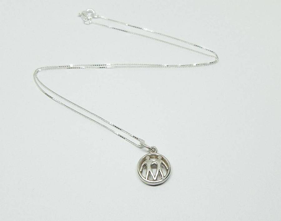 A vintage German 835 silver Gemini Zodiac sign pendant plus a sterling silver necklace