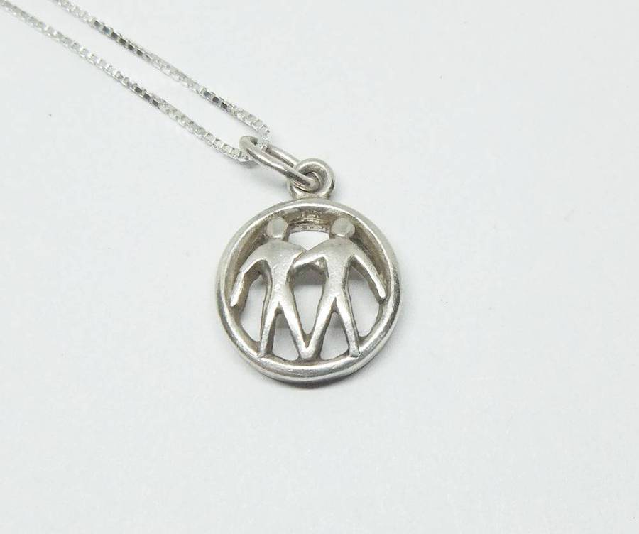 A vintage German 835 silver Gemini Zodiac sign pendant plus a sterling silver necklace
