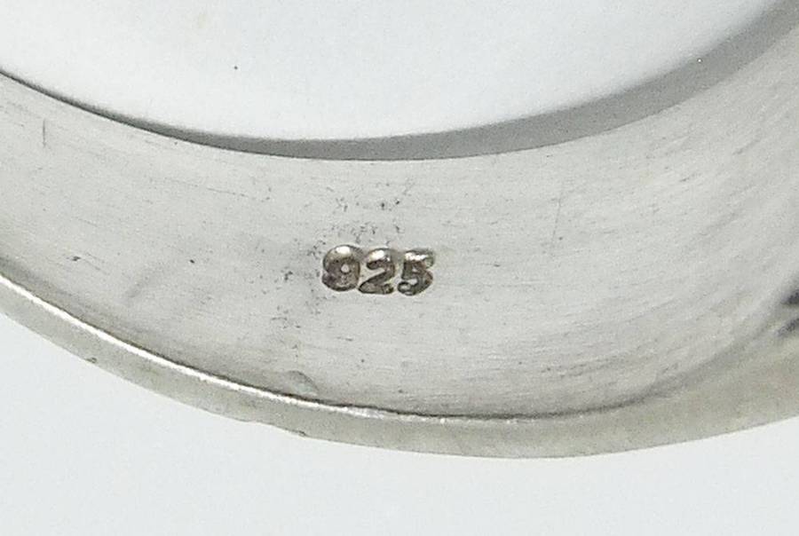 A superior quality vintage sterling silver ring set with a cabochon genuine Tigers eye stone