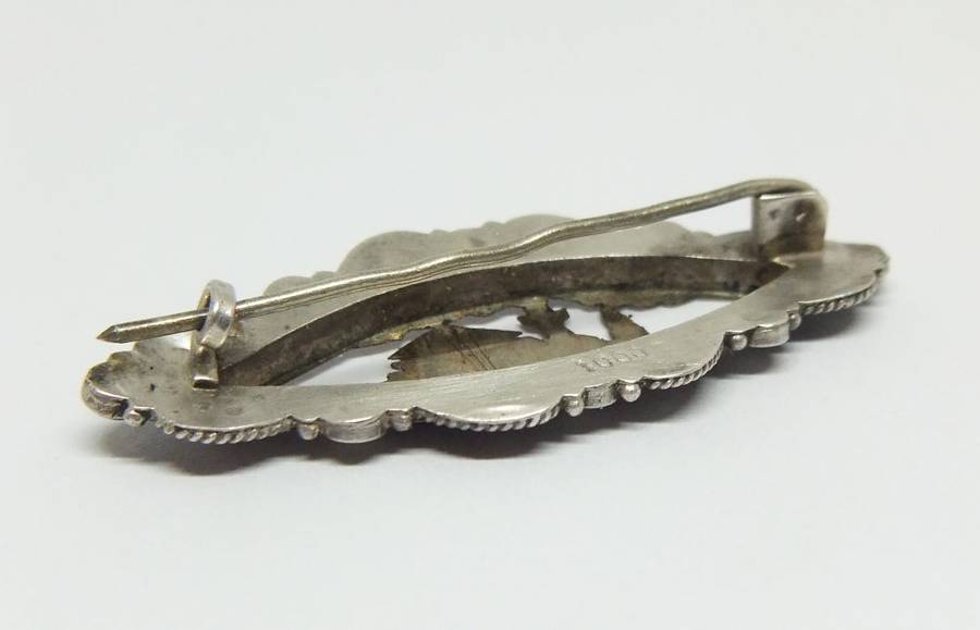 WOW !! AN UNUSUAL ANTIQUE SILVER AND GOLD TONE BROOCH WITH INCISED DECORATION AND MARCASITE !!