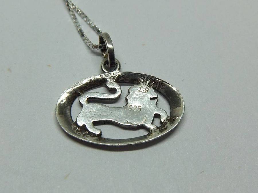 A vintage sterling silver Leo lion Zodiac pendant plus sterling silver necklace