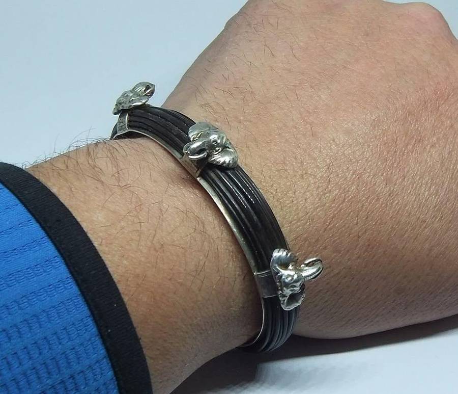AN AWESOME HIGH VALUE STERLING SILVER CUFF BANGLE WITH GENUINE ELEPHANT HAIR AND GREAT DETAIL