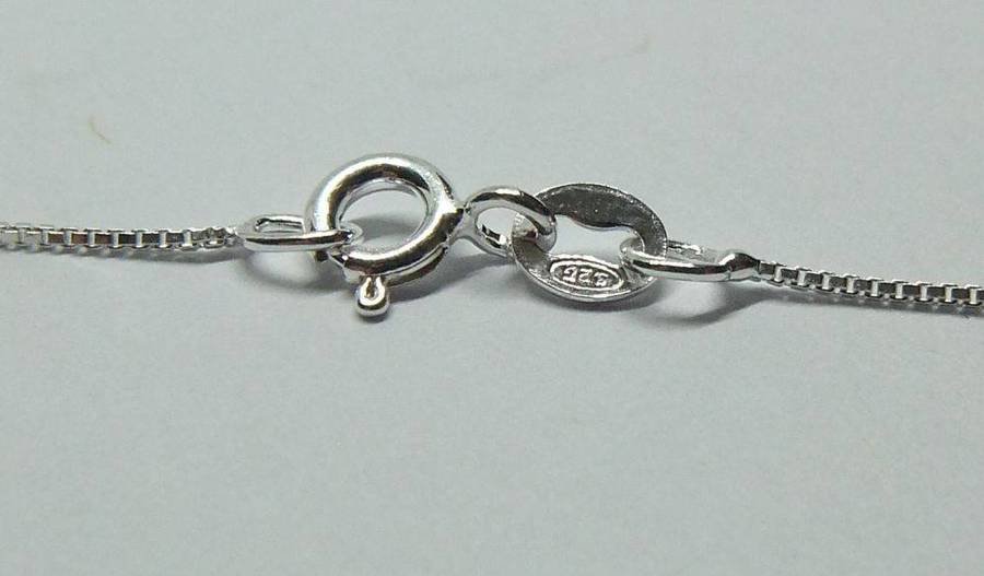 A vintage sterling silver Cancer Zodiac sign pendant plus a sterling silver necklace