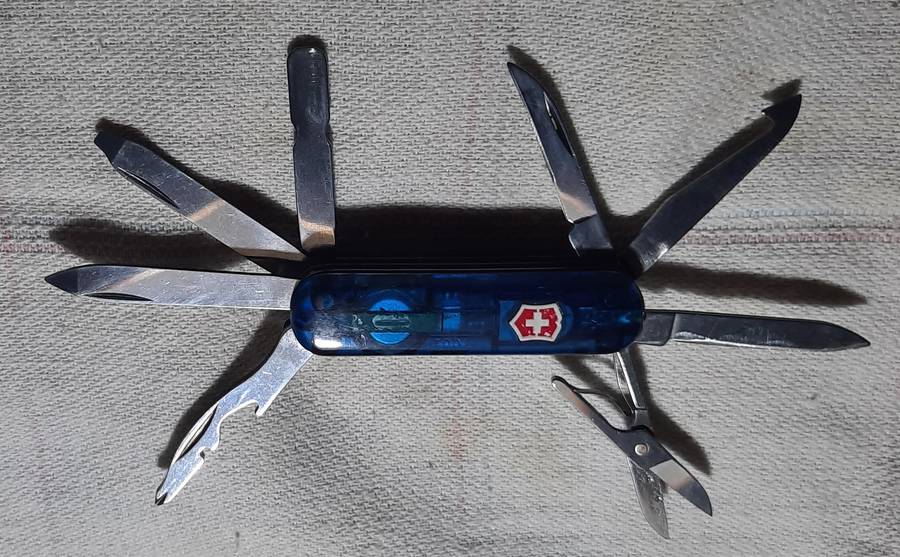 Victorinox Swiss Army Knife - Blue Translucent scales Midnight Mini Champ condition as per pictures