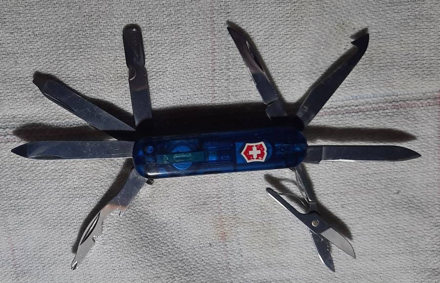 Victorinox Swiss Army Knife - Blue Translucent scales Midnight Mini Champ condition as per pictures