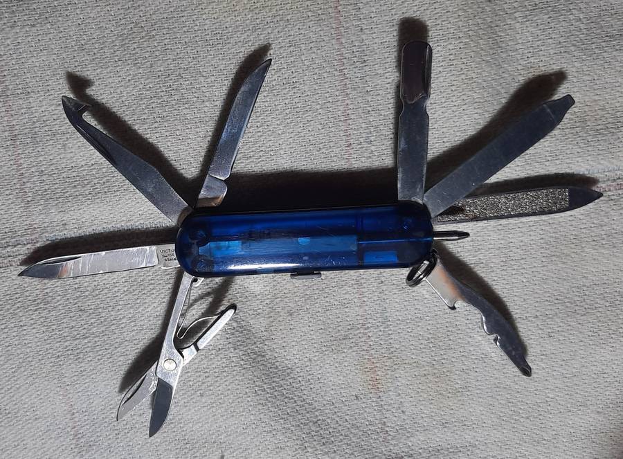 Victorinox Swiss Army Knife - Blue Translucent scales Midnight Mini Champ condition as per pictures