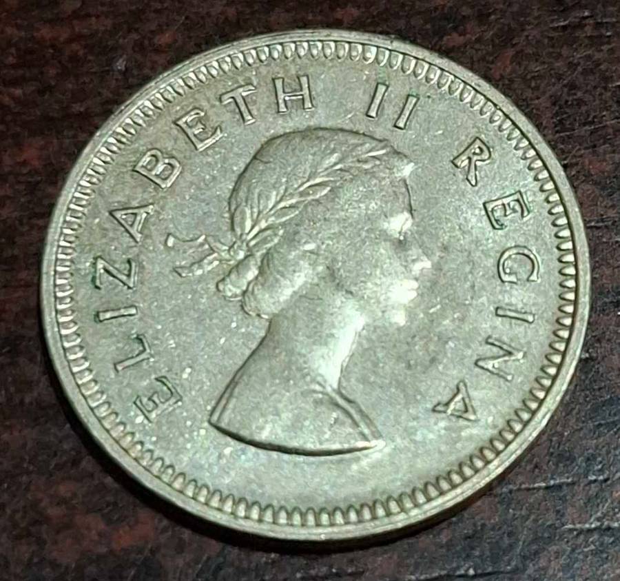 1958 South African Threepence coin, also known as a "tickey,"