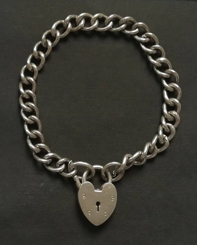 STERLING SILVER CHARM BRACELET WITH  HEART LOCK 180MM 18.1 GRAMS
