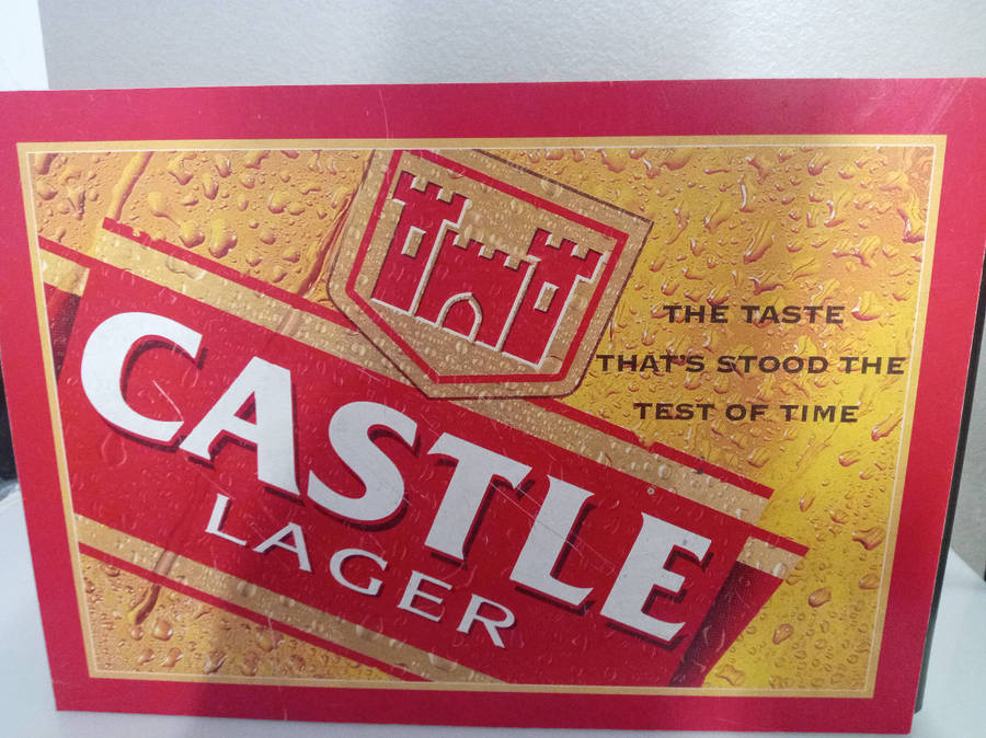 Bar Accessories : Castle Lager Plastic Sign and Empty Pint Crate.