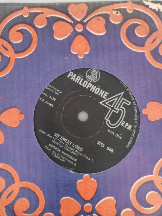 THE BEATLES / GEORGE HARRISON SEVEN SINGLES. AS PER PHOTOS.