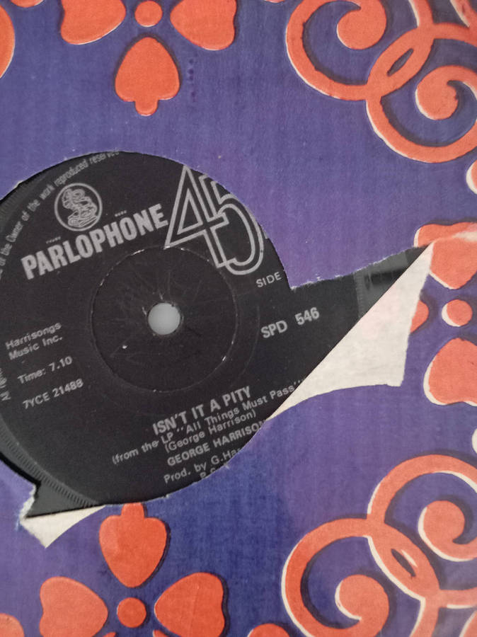 THE BEATLES / GEORGE HARRISON SEVEN SINGLES. AS PER PHOTOS.