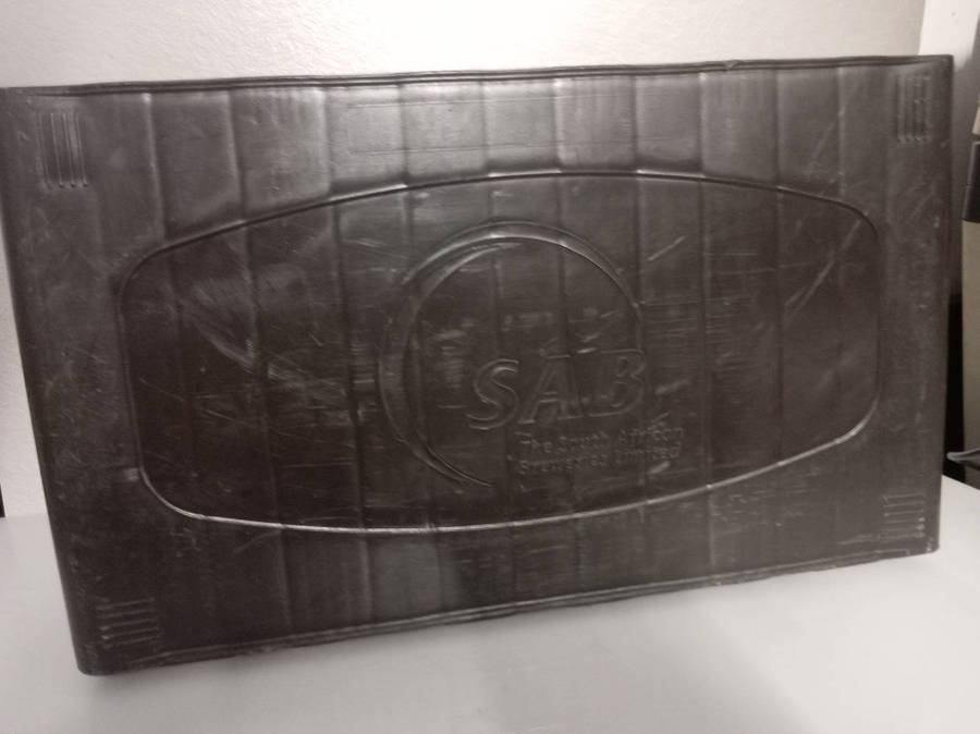 Bar Accessories : Castle Lager Plastic Sign and Empty Pint Crate.