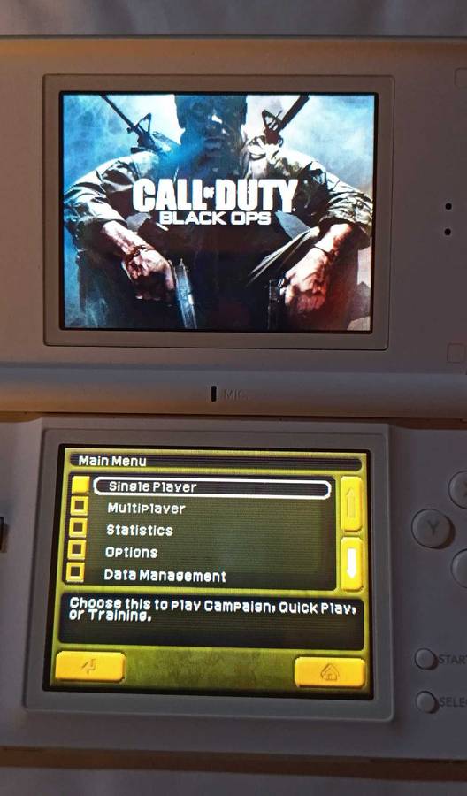 Nintendo DS Lite Console w/ original charger + 2 games