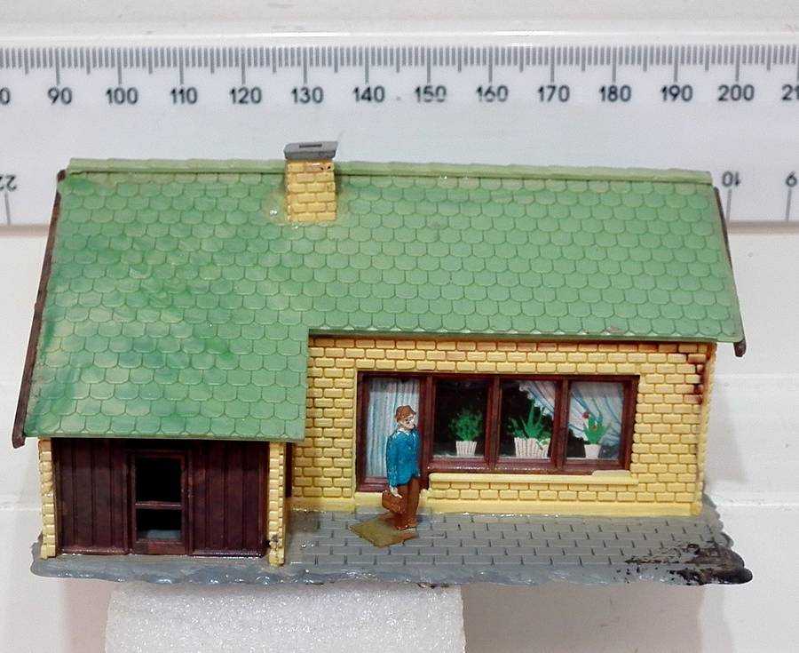 SENERY HO:  Plastic Residential House in Fair Used Condition.