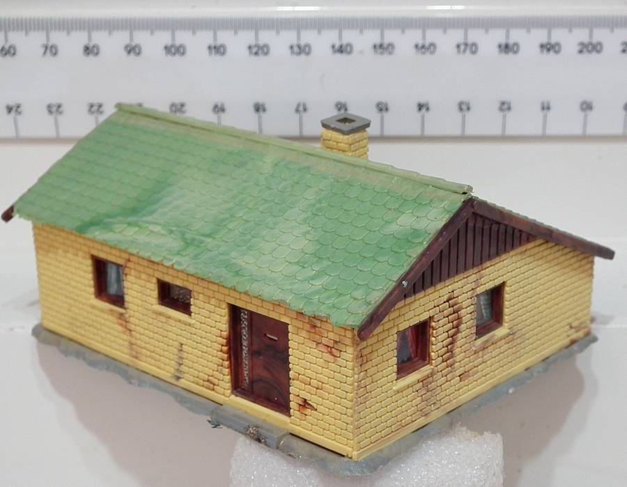 SENERY HO:  Plastic Residential House in Fair Used Condition.