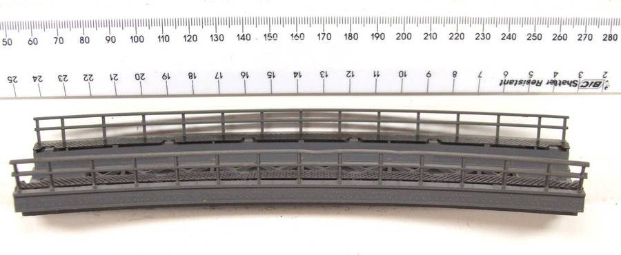 MARKLIN HO:  On Auction is this European Style Curved Bridge for M-Track in Good Used Condition.