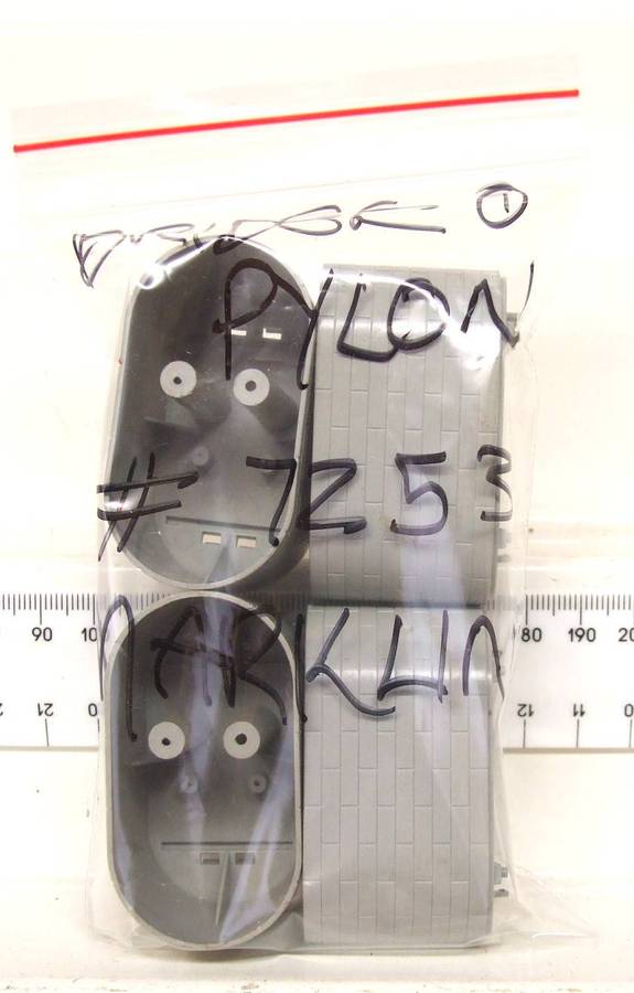 MARKLIN HO:  On Auction is this 4pc Bridge Pylons(7253) for M-Track in Good Used Condition.(GR)
