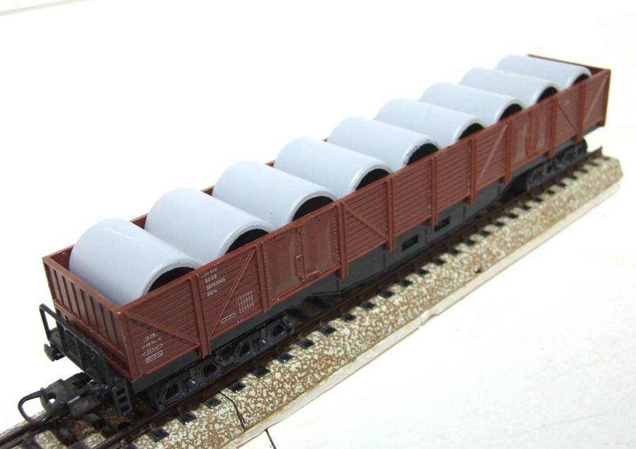 LIMA HO: Long Freight Wagon with Concrete Pipe Load in Fair Un-boxed, Used condition (Italy)