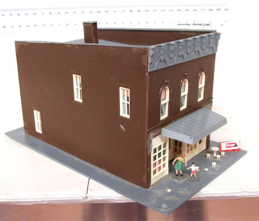 SCENERY HO:  On Auction is this European Plastic Multi Story Building in Fair Used Condition.