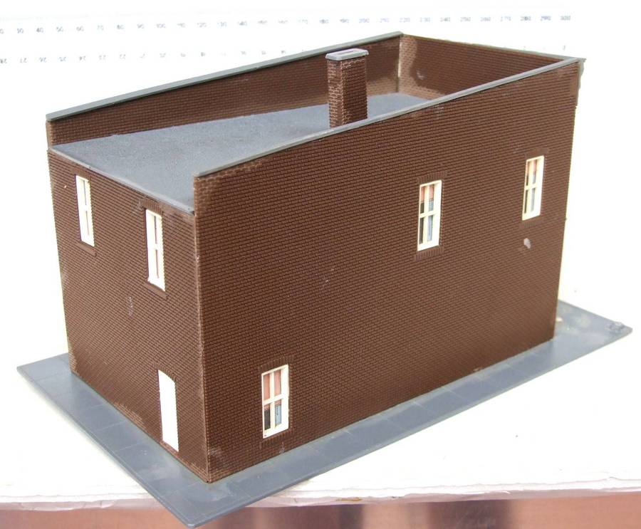 SCENERY HO:  On Auction is this European Plastic Multi Story Building in Fair Used Condition.