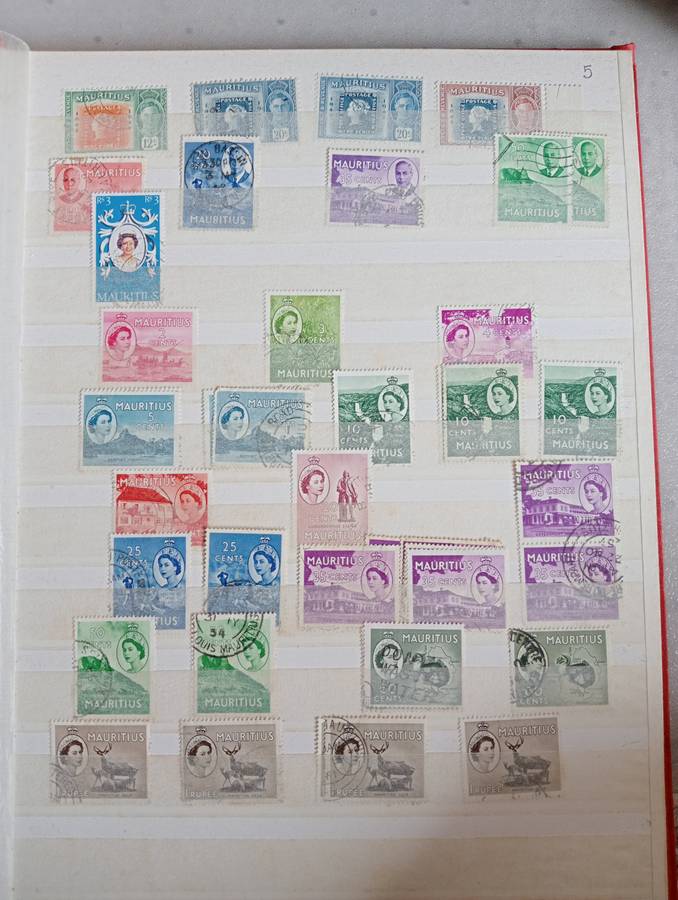 MAURITIUS AND SEYCHELLES IN A STOCK BOOK-MANY EARLY USEFUL,KGVI SEYCHELLES HAS TONING -CONDITION ISS